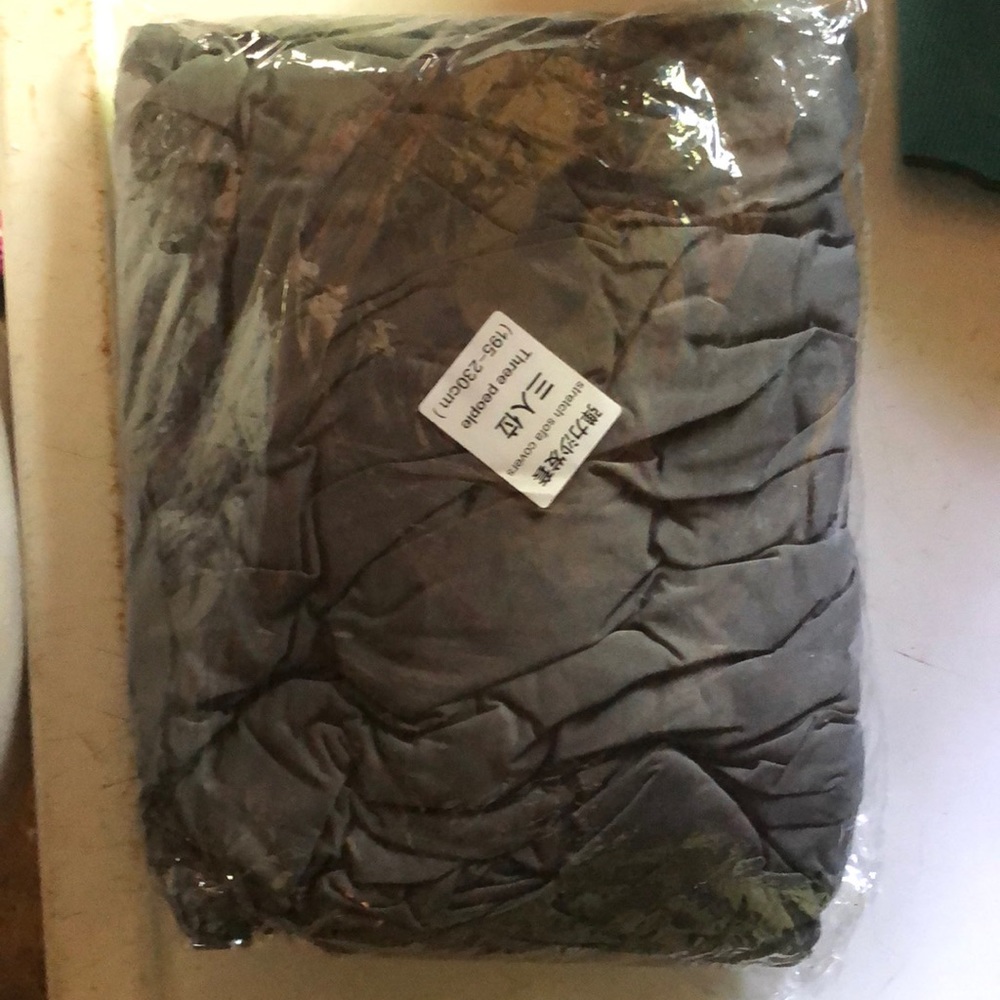 Gray 3 person couch slip cover